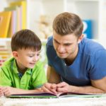 Father reading with son