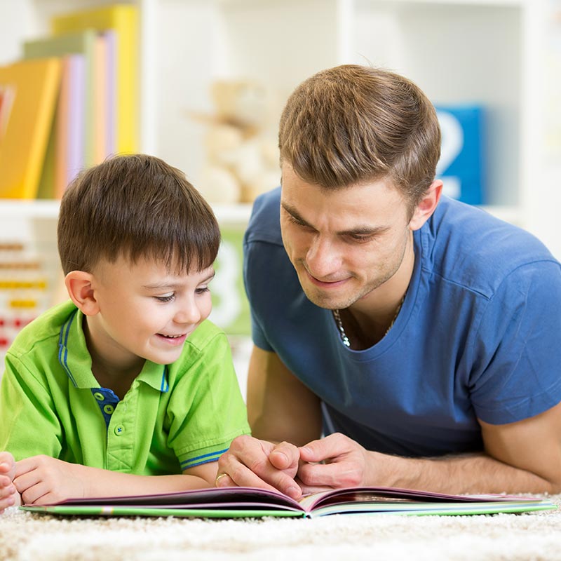 Father reading with son